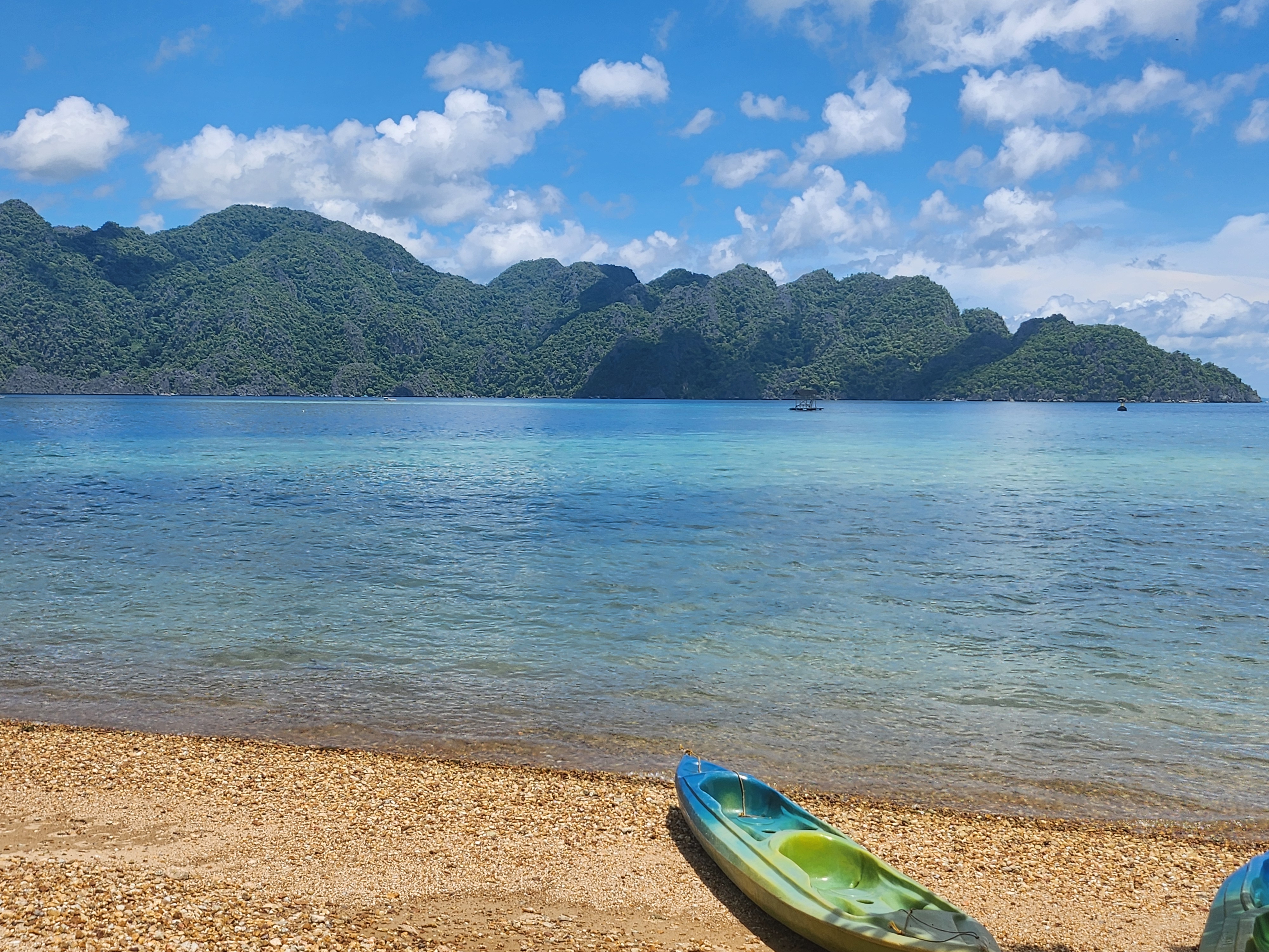Quiet beach and clear water in Coron