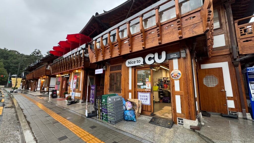 A traditional hanok street in Seoul on a rainy day